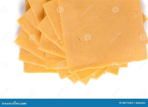 Slices of cheddar cheese stock image. Image of macro - 48275369