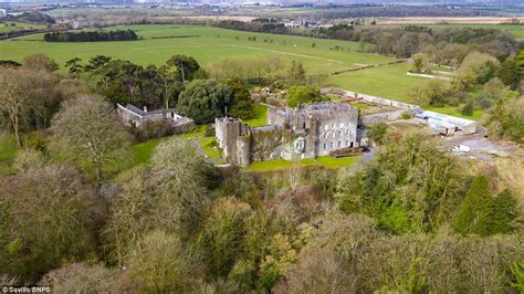 800-year-old Norman fortress complete with battlements goes on the market in Wales for £11 ...