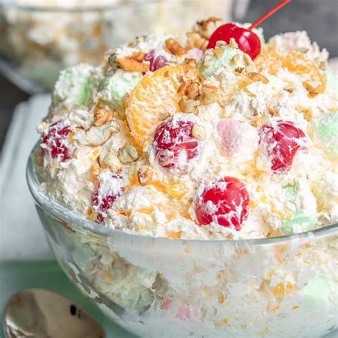 Light and fluffy Ambrosia Salad is a classic southern dessert made with Cool Whip and sour cream ...