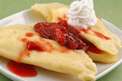 Sweet Dessert Pierogi with Strawberry Sauce