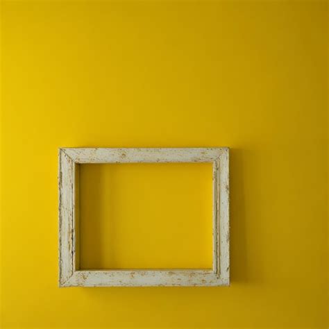 Premium AI Image | frame by a yellow wall