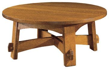 a wooden coffee table with wheels on the bottom and one leg raised up to allow seating for two ...