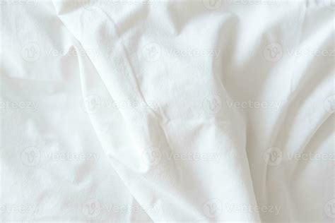 Abstract pattern of white crumpled bed sheet. White wrinkled fabric ...