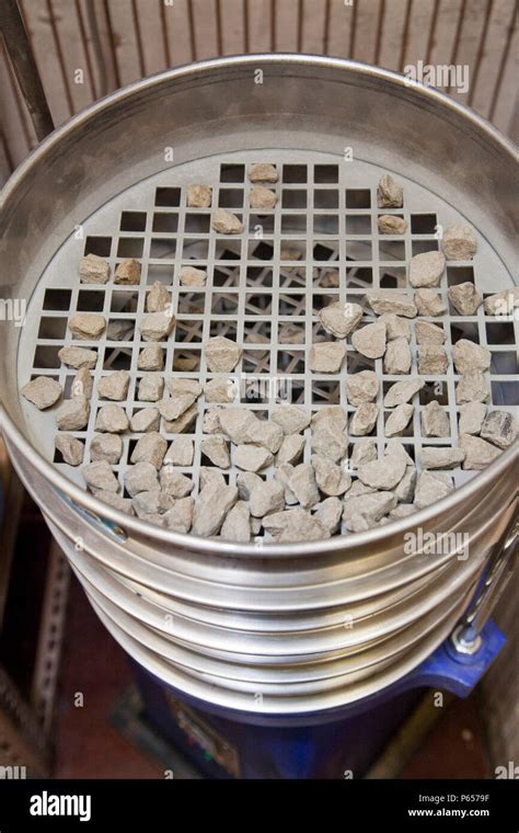 Sieves showing the different size materials from a test sample separated during the aggregate ...