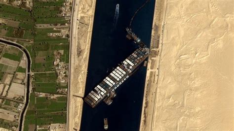 Suez Canal: Fresh effort to refloat wedged container ship - BBC News