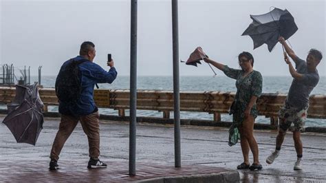 Hundreds stranded at Hong Kong airport as remnants of Typhoon Koinu hit ...