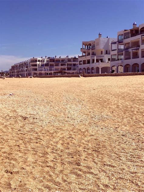 Glittering sands of Martil beach 21037599 Stock Photo at Vecteezy