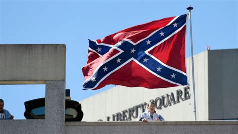 Protesters fly Confederate flag next to NCAA arena