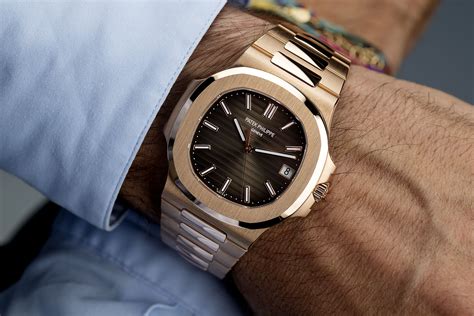 Patek Philippe Nautilus Watches | ref 5711/1R-001 | Rose Gold 'Patek Warranty' | The Watch Club