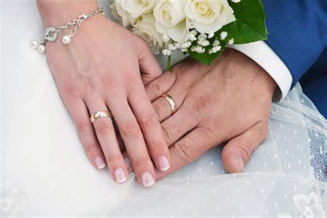 Hands With Wedding Rings Stock Photo - Image: 49719536