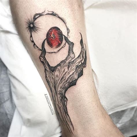 Behelit and eclipse tattoo : Berserk