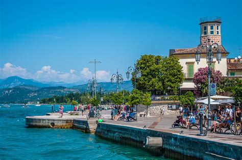 The lakefront promenade of the town of Lazise - Lake Garda, Italy ...