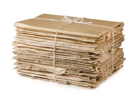 Waste cardboard bundle for recycling isolated on white Stock Photo Corrugated Board, Corrugated ...