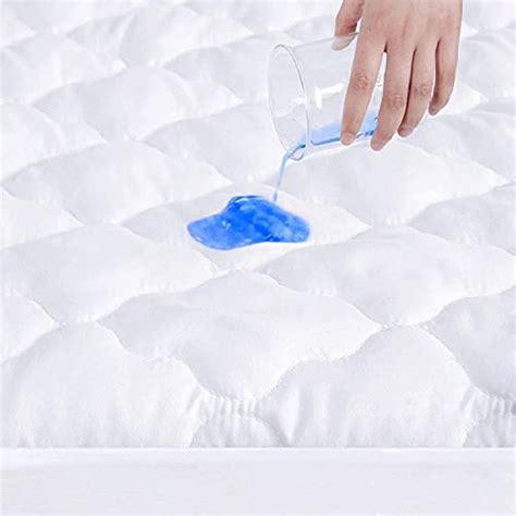 Best Mini Crib Mattress Pads To Keep Your Baby Cozy