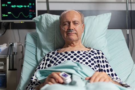 Premium Photo | Portrait of sick senior man patient resting in hospital ...