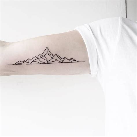 46 Magnificent Mountain Tattoo Designs - TattooBloq | Minimalist tattoo, Mountain tattoo design ...