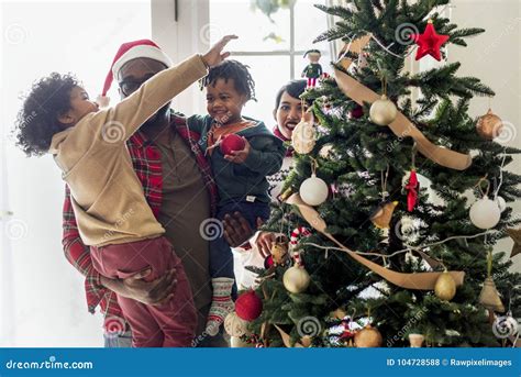 A Black Family Enjoying Christmas Holiday Stock Photo - Image of season ...