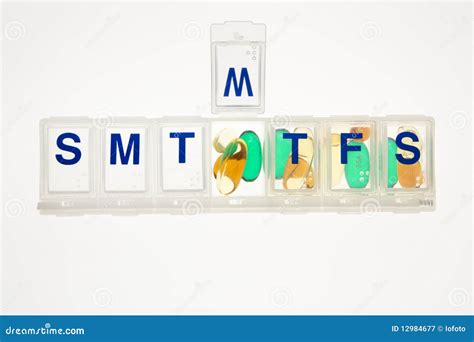 Pills in a Pill Organizer. Isolated Stock Image - Image of dosage ...