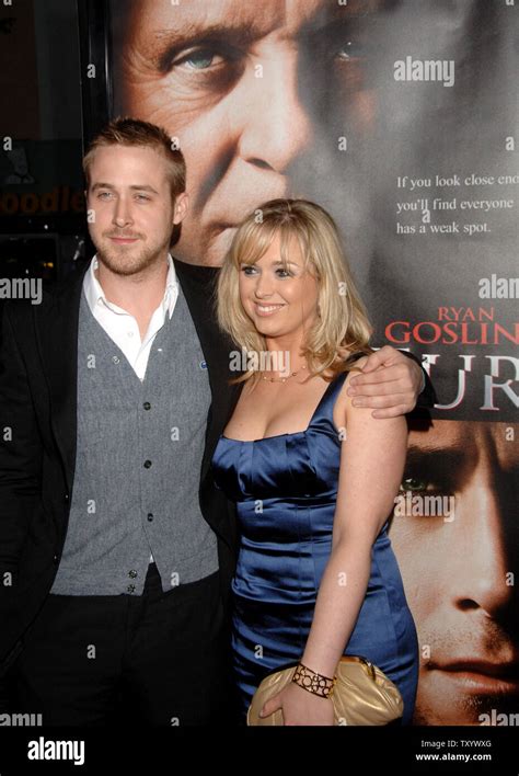 Ryan Gosling (L), a cast member in the motion picture thriller "Fracture", arrives with his ...