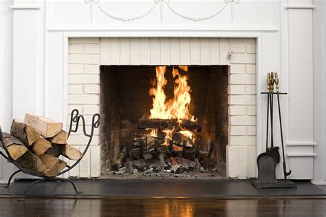 How to Use a Fireplace Grate | Hunker