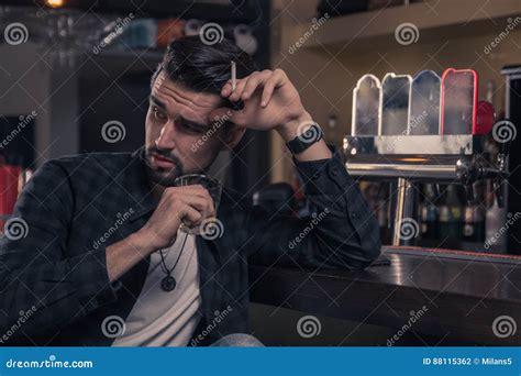 Young Man Sitting Bar Drinking Stock Photo - Image of handsome, adult: 88115362