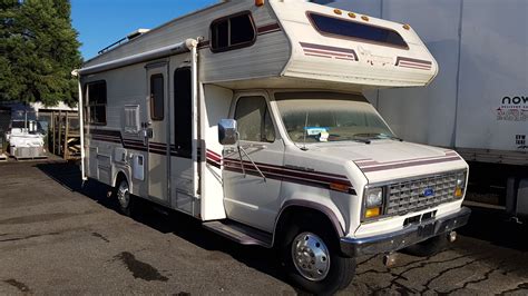 1987 FORD MOTORHOME, MODEL #MM23056, WHITE, GAS, AUTOMATIC, VIN ...