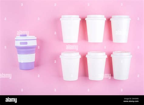 Reusable coffee cup vs disposable cups Stock Photo - Alamy