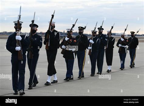 Members of the Joint Forces Color Guard practice marching during the ...