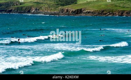 Surfer at Polzeath in North Cornwall Stock Photo - Alamy