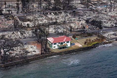 Mystery shrouds the photo of a red-roofed house that survived Hawaii ...