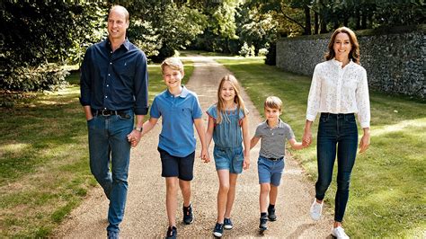 Prince William, Kate Middleton beam as they hold hands with their three ...