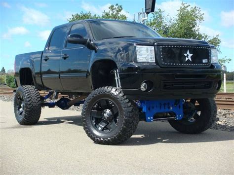 gmc lifted trucks black - Sam Higginbotham