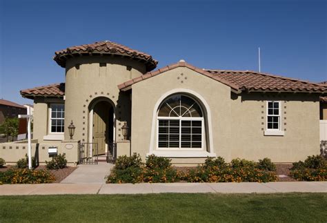 Exterior Brown, Tan and Mediterranean Stucco and Stone House - South Arlington Tx