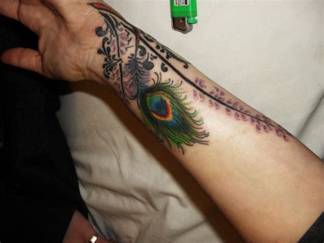 Peacock feather tattoo by Crissixx on DeviantArt