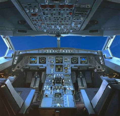 the inside of an airplane cockpit at night