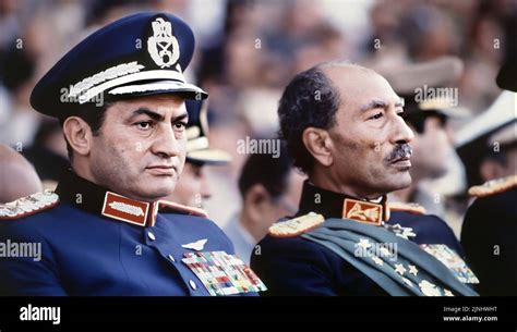 Egyptian President Mohamed Anwar El-Sadat and Mohamed Hosni Mubarak in military uniform ...