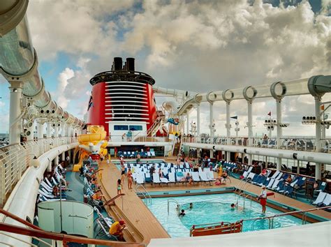 The pool deck on the Disney Dream isn't very crowded in the early ...