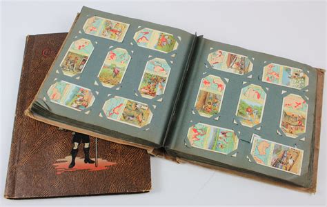 Old cigarette card album with earlier Players & Wills material (2 albums)