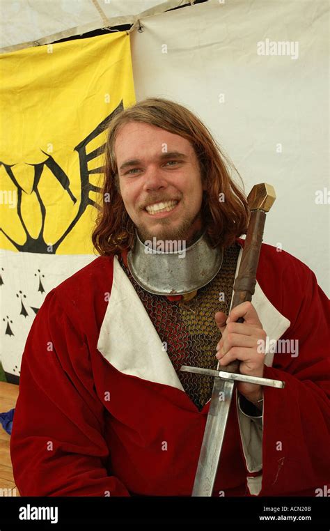 Medieval age of chivalry knight squire posing with weapon of choice DSC 1137 Stock Photo - Alamy