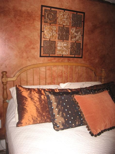 Sponge painted accent wall topped with a coat of stain - gives it a leathery finish! | Amazing ...