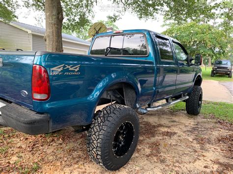 2002 Ford F-250 Super Duty Ultra Carnivore Rough Country Suspension Lift 8" | Custom Offsets