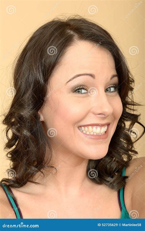 Attractive Young Woman Grinning Showing Her Teeth Stock Image - Image ...