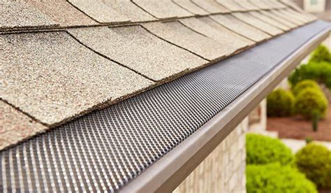 Installing Downspout Screens And Gutter Guards Reduces Gutter Cleaning