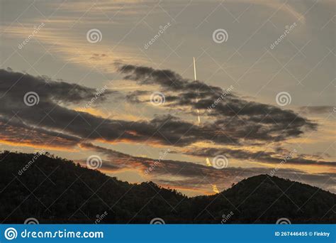 Condensation Lines of an Airplane Above Clouds at Sunset Stock Image - Image of sunrise, flying ...