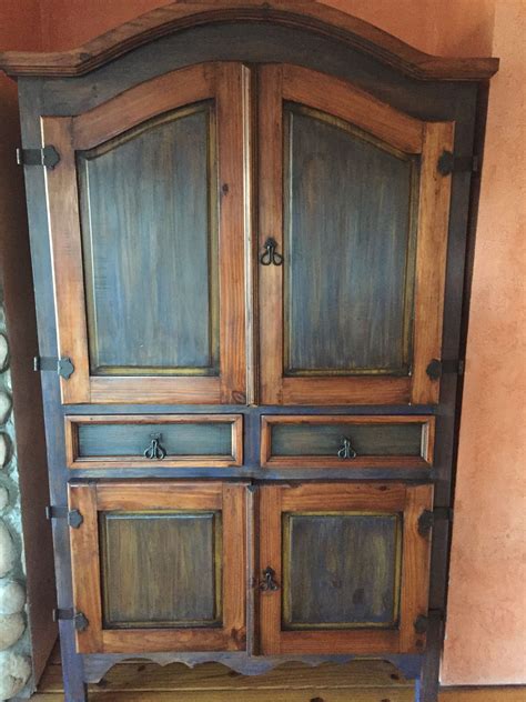 A Mexican pine entertainment armoire we purchased second hand. We used ...