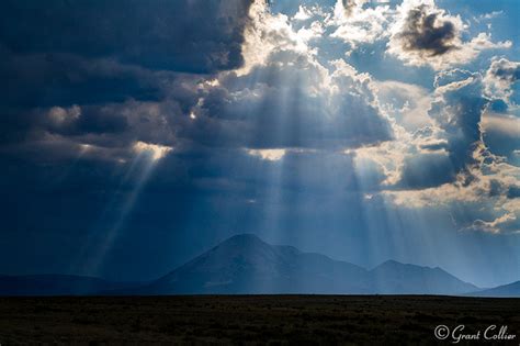 Crepuscular Rays Emerge over Colorado's Rocky Mountains