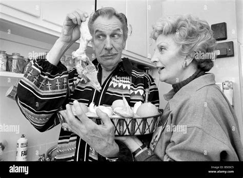 Actor and chef Vincent Price and his wife Coral seen here in the kitchen. May 1975 Stock Photo ...