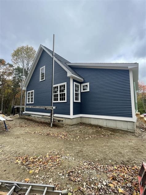 Our current build. Vinyl siding, aluminum rake/fascia trim, versatex corner posts and frieze ...