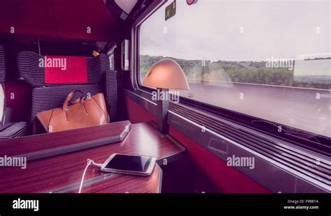 Window seat in a modern comfortable train Stock Photo - Alamy