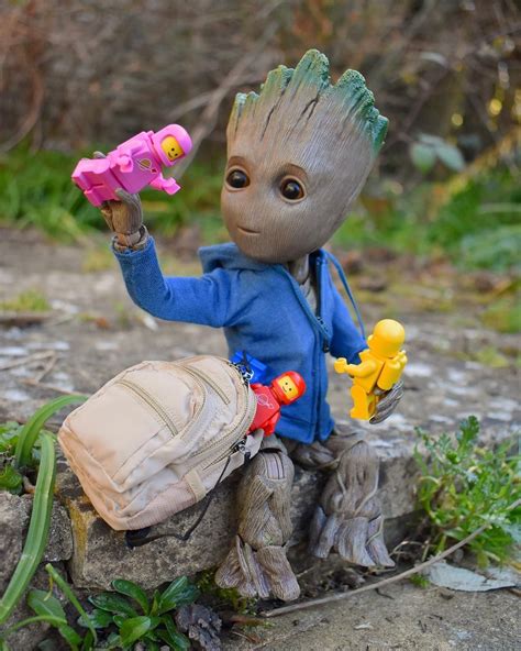 Baby Groot loves playing with his Lego space figures 😆… | Обои, Марвел